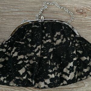 The Many Moods of Poppie Jones | Black Lace Clutch